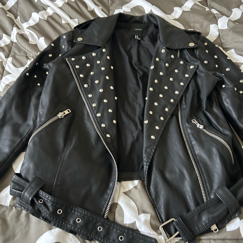 This is a Forever 21 women’s motorcycle studded jacket